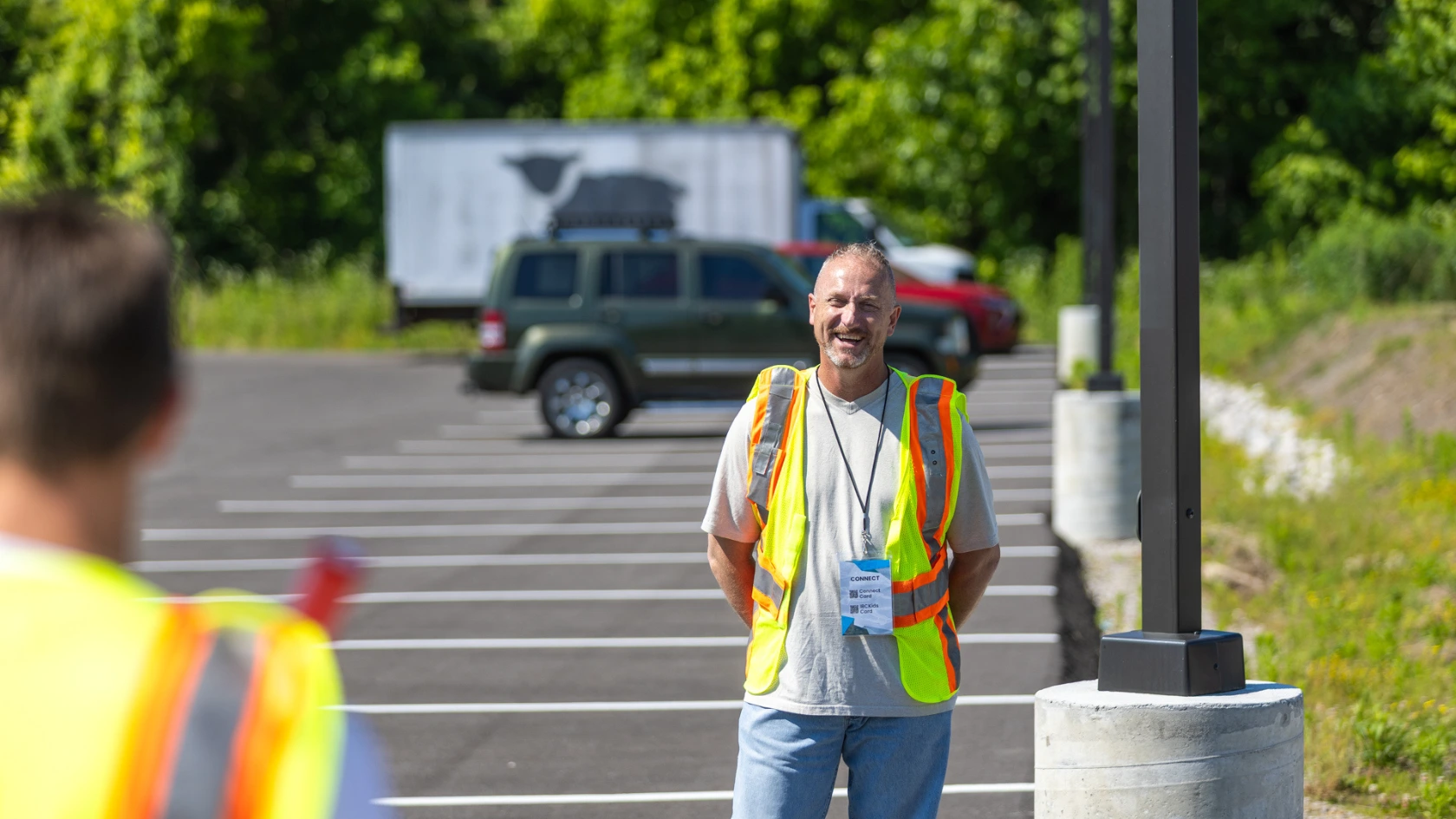 Allen wearing his parking lot team vest