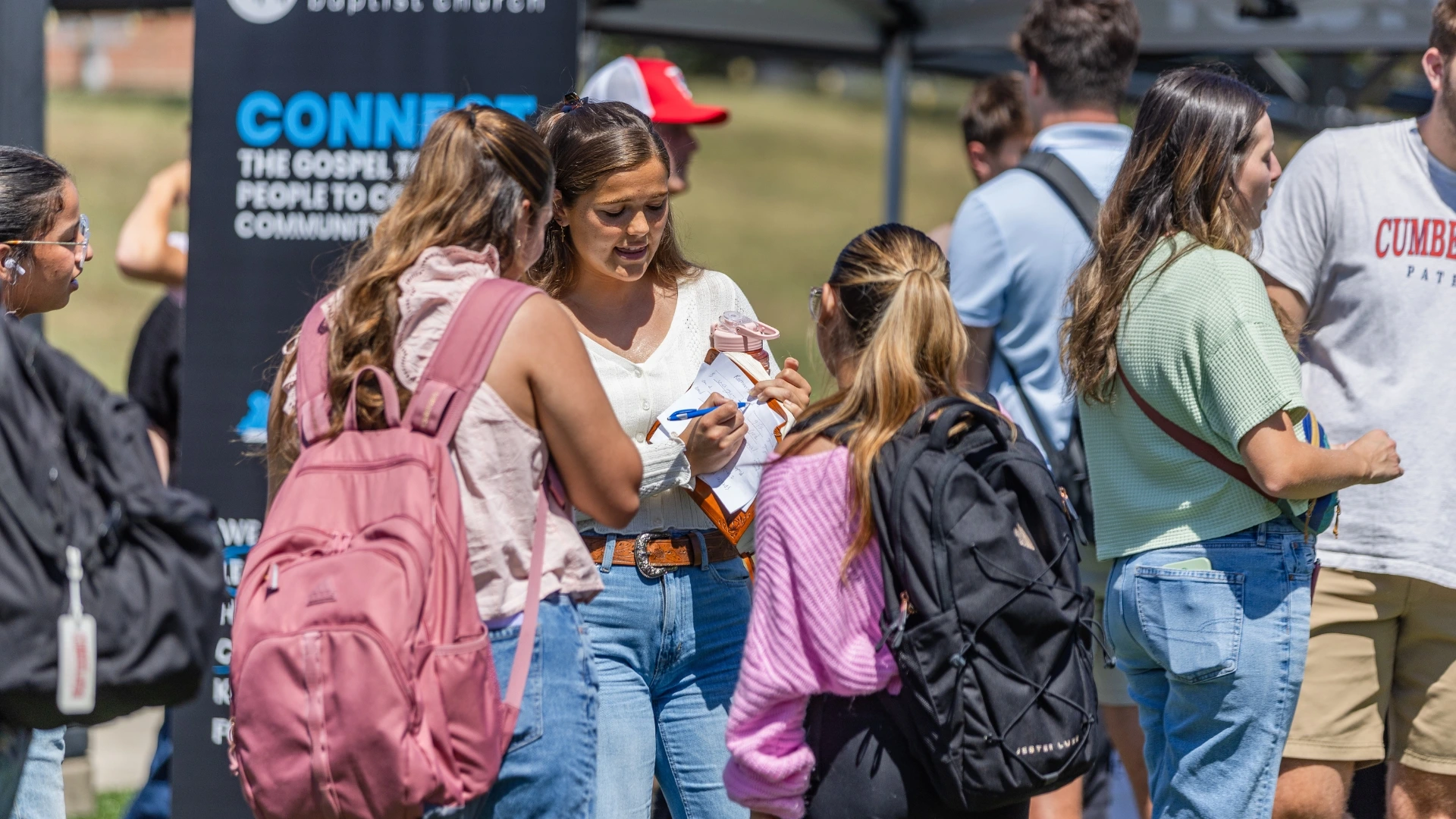 A college student sharing the bridge diagram with another college student at the University of the Cumberlands.