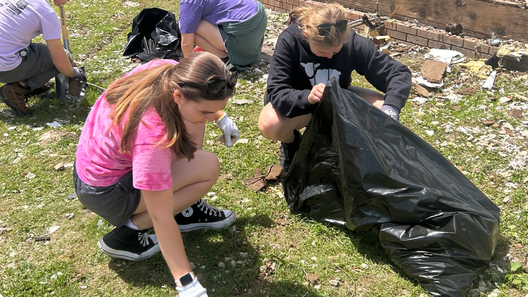 church interns cleaning up after disaster
