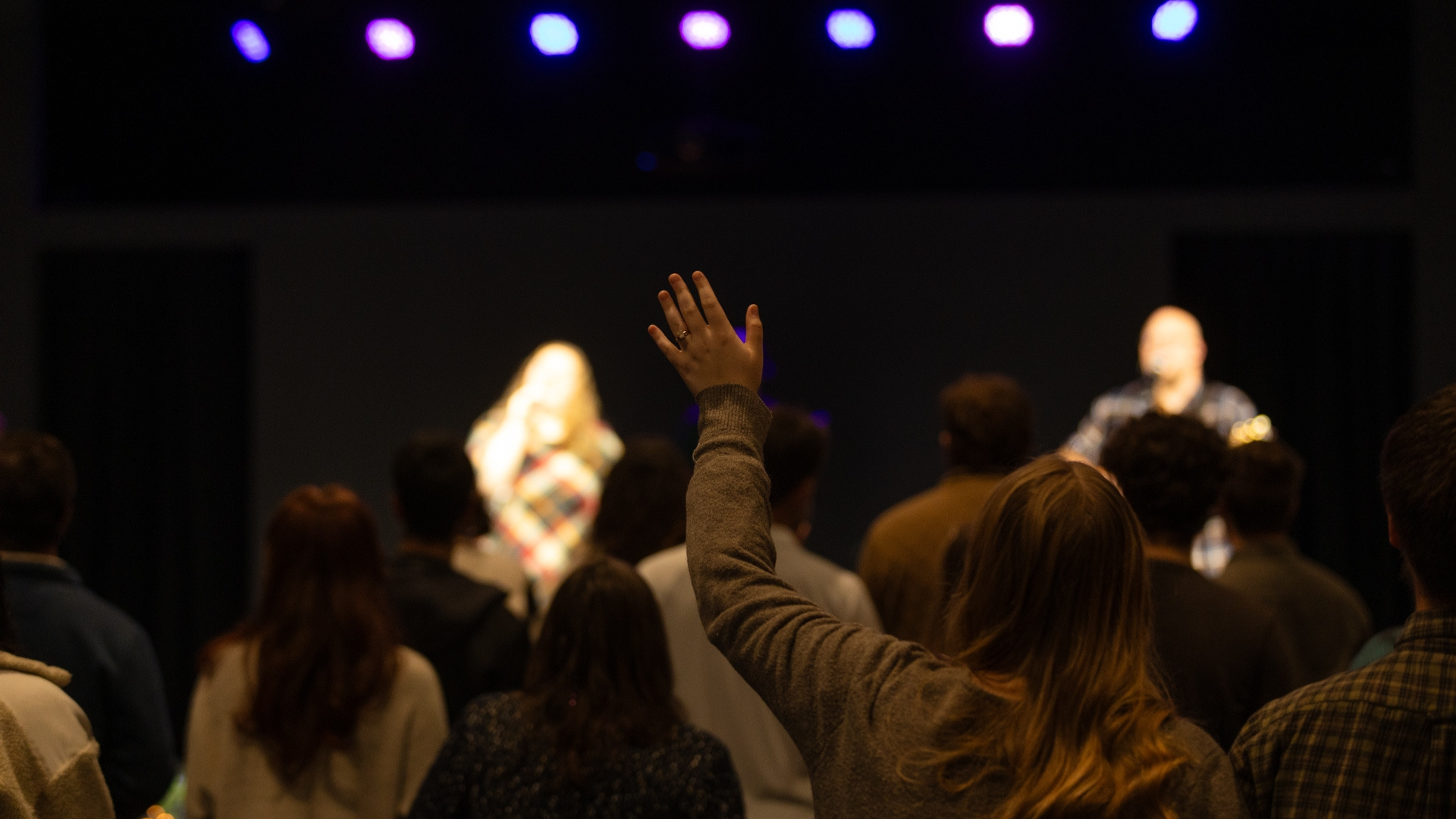 A person worshiping at church on the Sabbath
