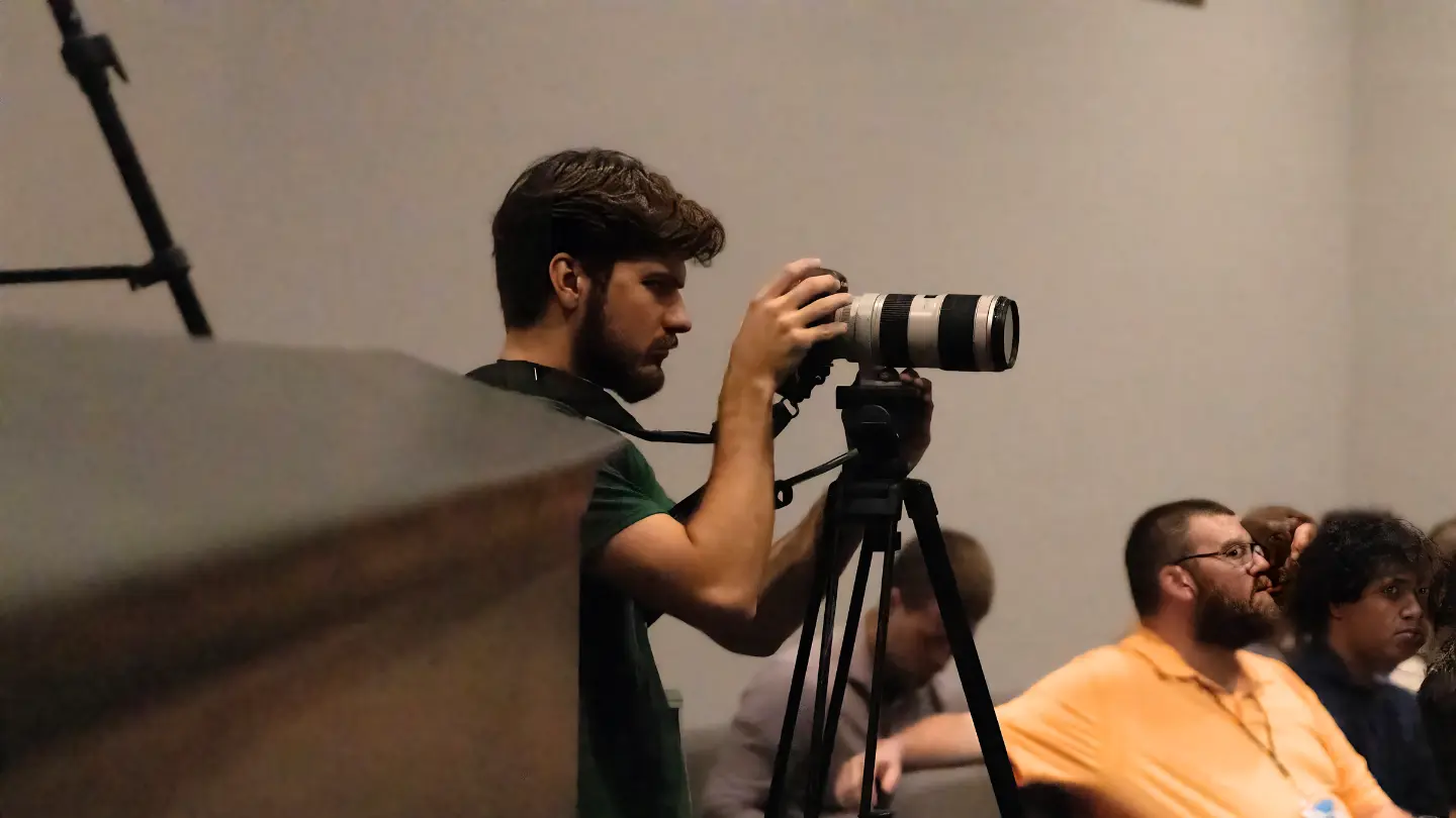 AJ serving through Photography