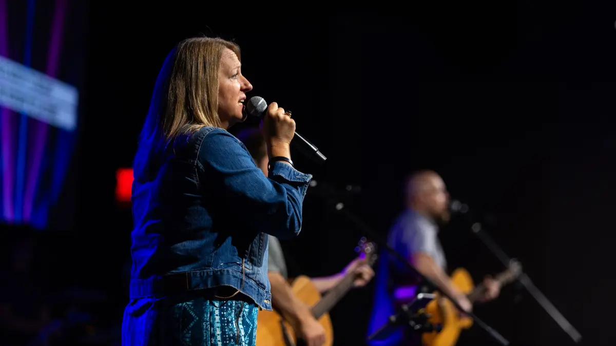 Annette singing and leading worship
