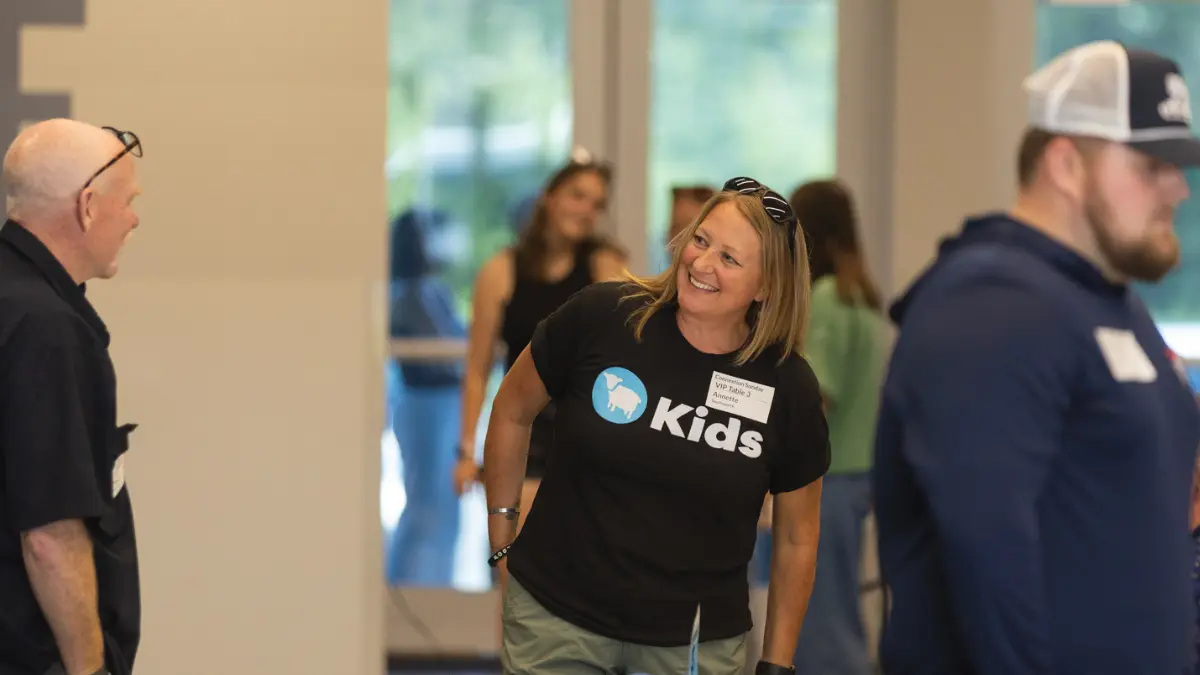 Annette wearing her IBCKids serve team shirt