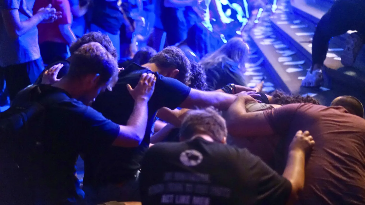 Students praying at the altar at Lucid Late Nights