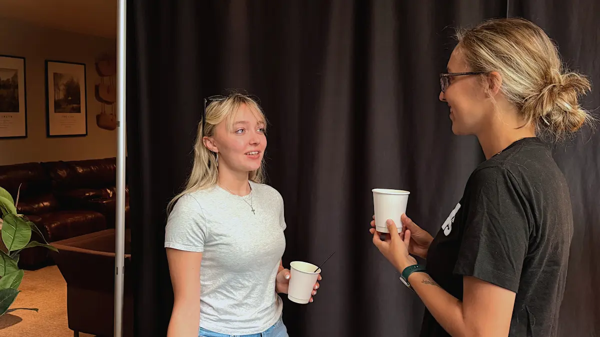 Mackenzie Speaking with a team member at the Immanuel Baptist Church Richmond Campus