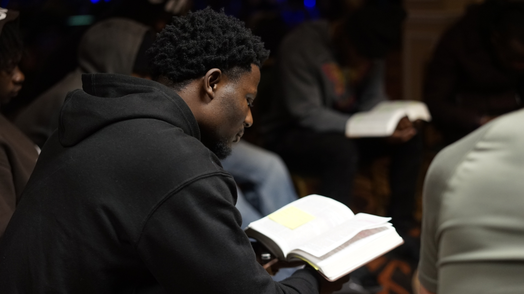 Young man studying the Bible