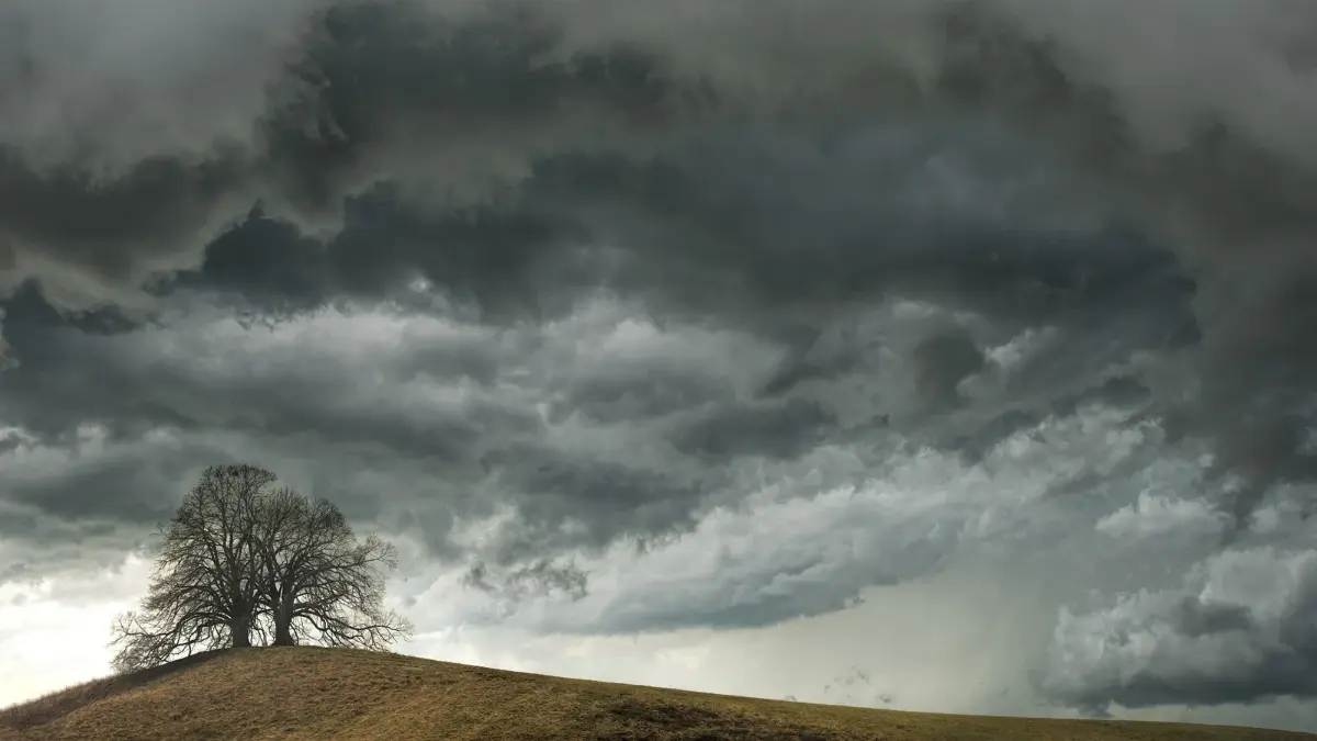 Dark clouds symbolizing spiritual attack